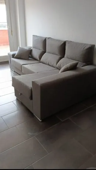 Sofá modular gris tela