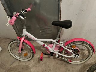 Bicicleta infantil Btwin rosa y blanca
