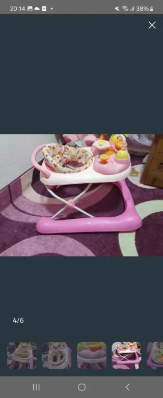 Andador bebé rosa con juguetes