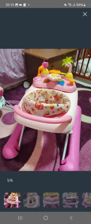 Andador bebé rosa con juguetes