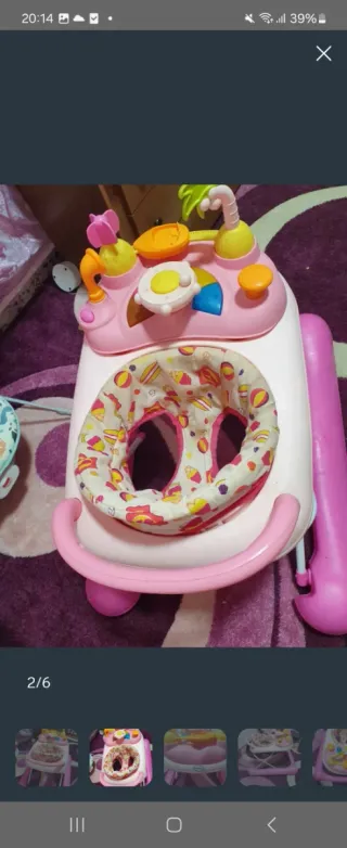 Andador bebé rosa con juguetes