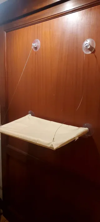 Colgador para gatos en ventana