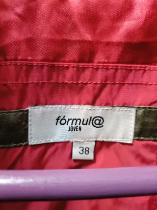 Chaqueta chubasquero Formula Joven color fucsia