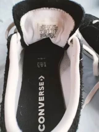 Converse One Star negras ante