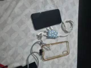 iPhone X 256GB + AirPods sin funda carga