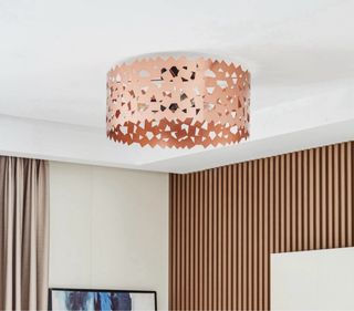 Lámpara de techo cobre diseño geométrico.