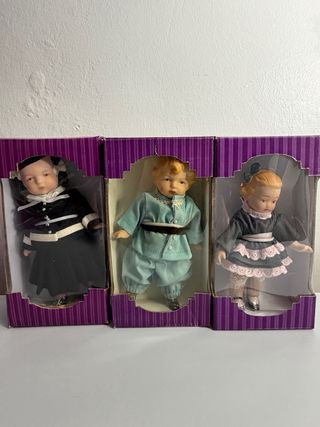 Confezione di bambole in porcellana antiche