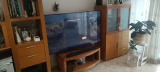 Mueble de salón madera y cristal