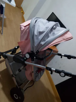 Carro de bebé niña rosa y gris