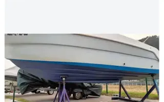 Barco a motor y pesca para Titulín