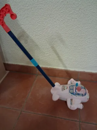 Avión de empuje rosa para niños