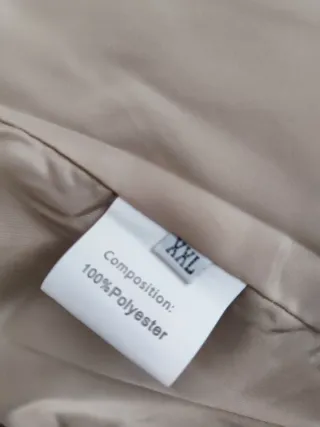 Blazer tweed beige con cuello marrón