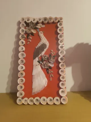 Pavo real decorativo de conchas