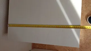 Mueble de salón blanco con cajones