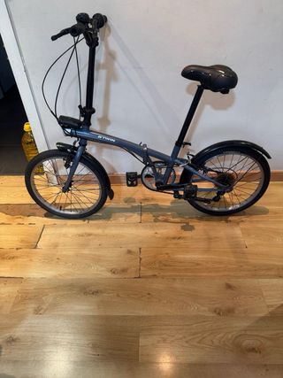 Bicicleta plegable 20 gris llantas asiento nuevo