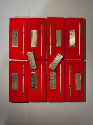 Lote 8 mecheros y bolígrafos