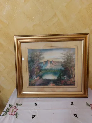 Quadro con cornice dorata
