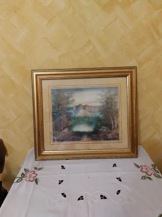 Quadro con cornice dorata