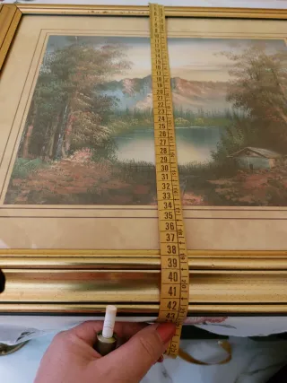 Quadro con cornice dorata