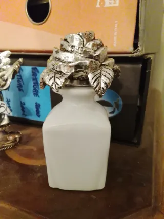 Angelo portacandele in metallo vari oggetti