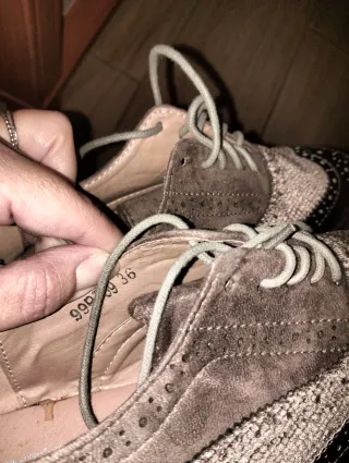 Zapatos con alza marrones y plateados