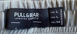 Bermudas chico grises