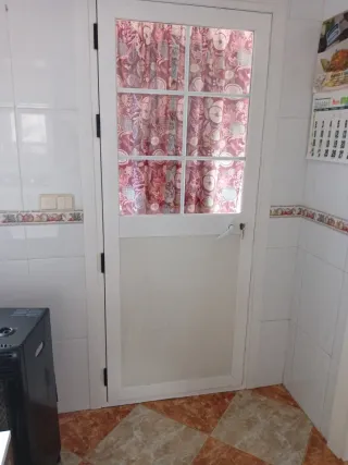 Puerta aluminio doble cristal