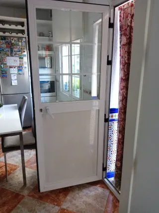 Puerta aluminio doble cristal