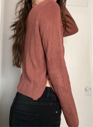 Cárdigan de punto rosa con cordones