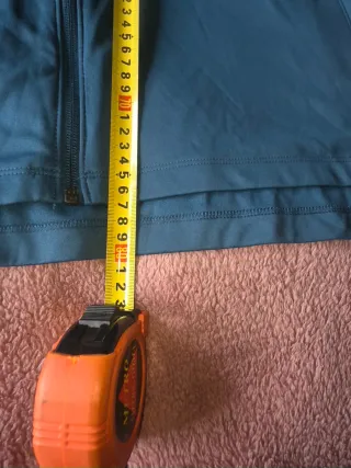 Chaqueta deportiva Nike azul y rosa