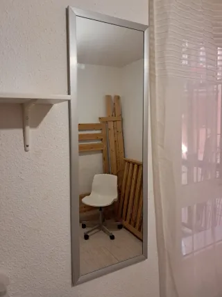 Espejo de pared plateado