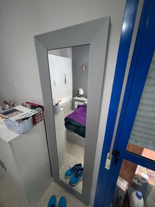 Espejo de pared plateado