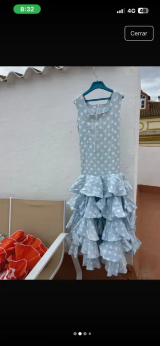 Traje de flamenca verde y rosa