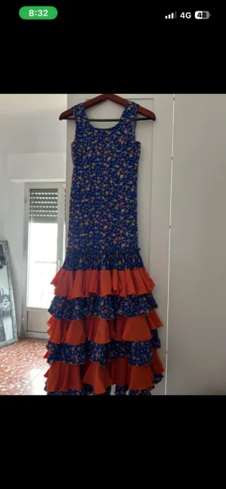 Traje de flamenca verde y rosa