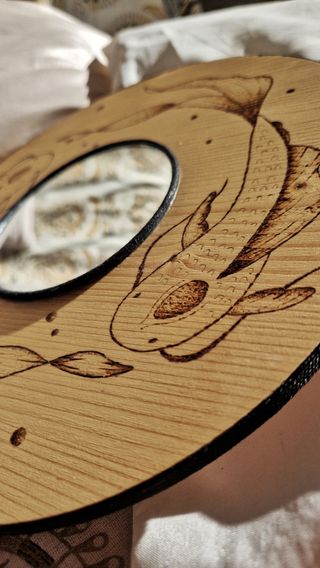 Specchio rotondo in legno