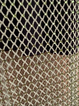 Vestido de red verde con pedrería + vestido negro