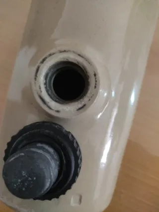 Antiguo calentador de pies de cerámica