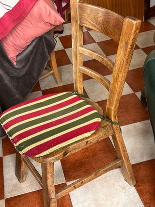 Sofá de piel verde y madera de Roble macizo