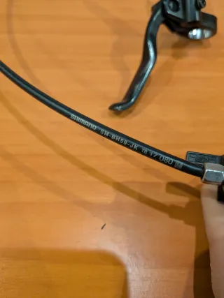 Freno Shimano MT200 Delantero + pinza trasera