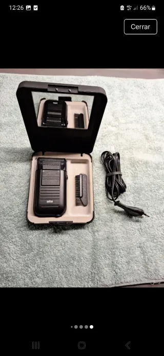 Maquinilla electrica afeitar Braun.