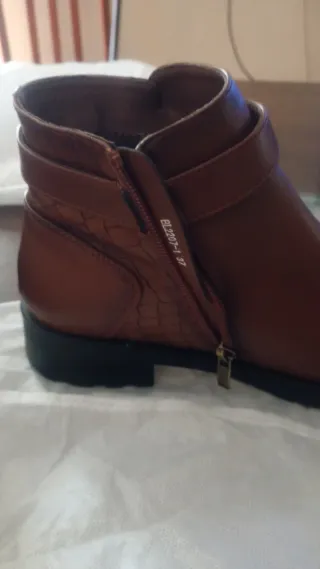 Botines de estilo cuero marrones