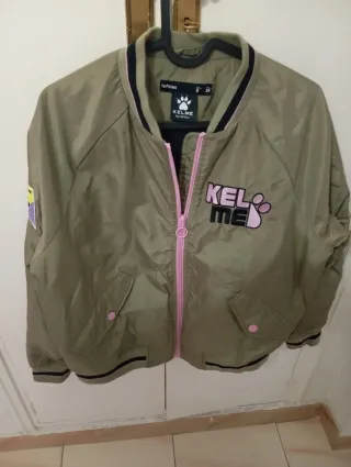 Cazadora bomber Kelme verde y rosa Talla S