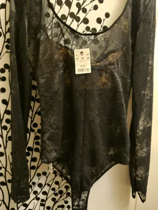 Body con reggiseno pizzo nero e oro