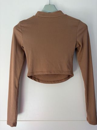 Top manga larga con abertura