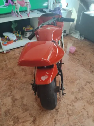 Mini Moto Eléctrica Infantil Roja y Blanca