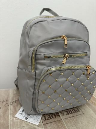 Zaino donna grigio con borchie oro