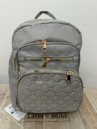 Zaino donna grigio con borchie oro