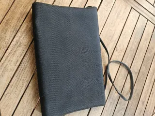 Borsa pochette nera in tessuto