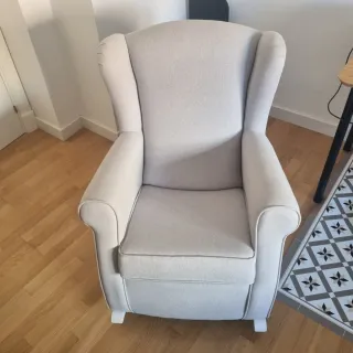 Poltrona a dondolo beige in tessuto