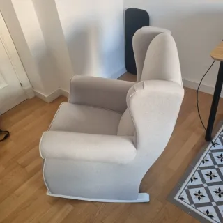 Poltrona a dondolo beige in tessuto